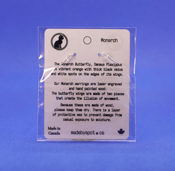 Monarch butterfly earrings package back, includes a description and care instructions.
